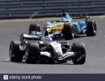 mclarens-formula-one-driver-kimi-raikkonen-front-of-finland-takes-a-curve-followed-by-renaults...jpg