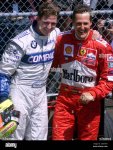 germanys-ralf-schumacher-l-is-congratulated-by-his-brother-michael-schumacher-following-his-vi...jpg