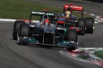 Michael-Schumacher-leads-Lewis-Hamilton-Italian-GP-Monza-F1-2011-Photo-Daimler.jpg