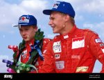 race-winner-mika-hakkinen-fin-left-and-third-place-finisher-mika-salo-fin-british-formula-thre...jpg
